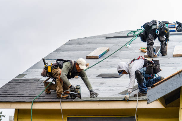 Professional Roofing technician working in Brookline, NH